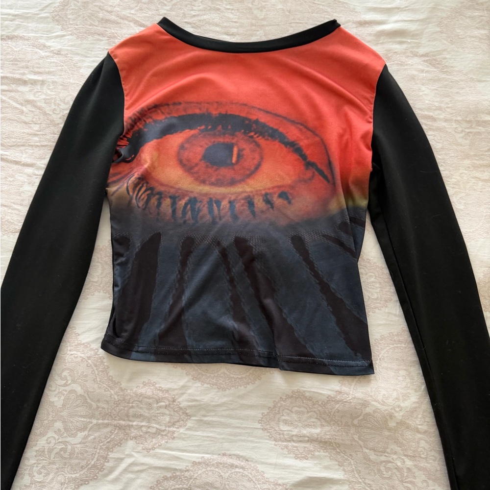 Graphic Long Sleeve Crop Top - Black and Orange Eye Print